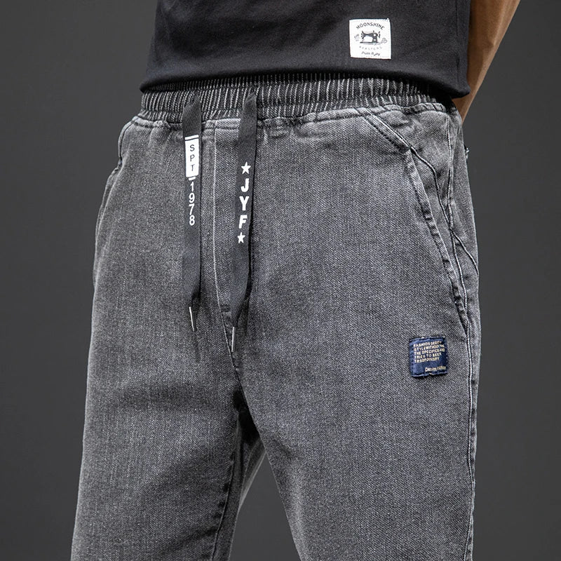 Tavaszi-nyári fekete kék cargo farmer férfi utcai viselet farmer jogger nadrág férfi bő farmer nadrág plus size