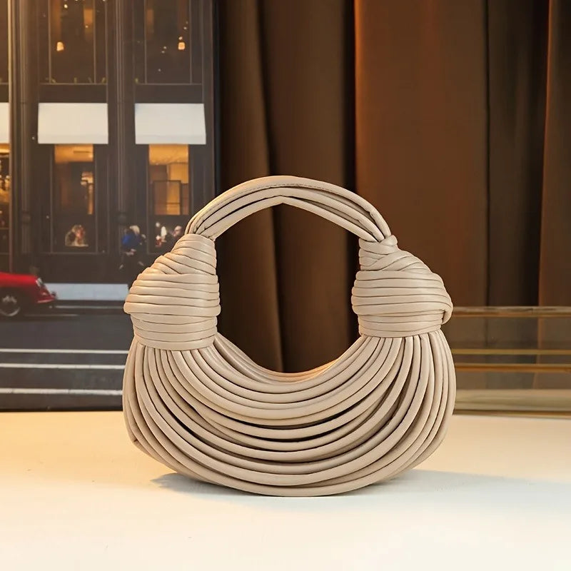 Női kézitáskák 2025 új arany luxus designer márka kézzel szőtt tésztatáskák kötél csomózott húzott hobo ezüst estélyi clutch sikkes