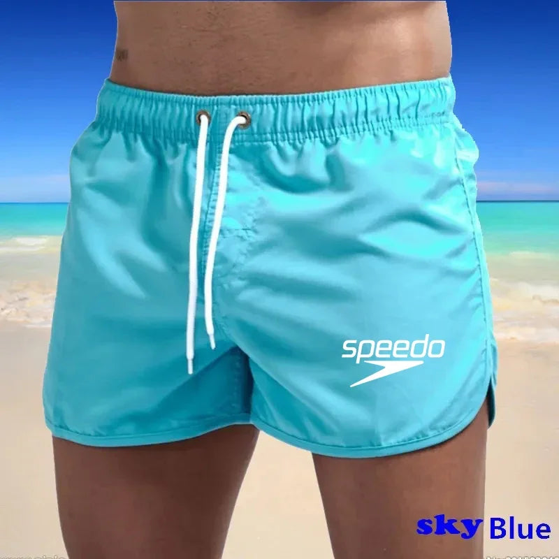 Szexi férfi fürdőruha strand úszónadrág szörfdeszkához