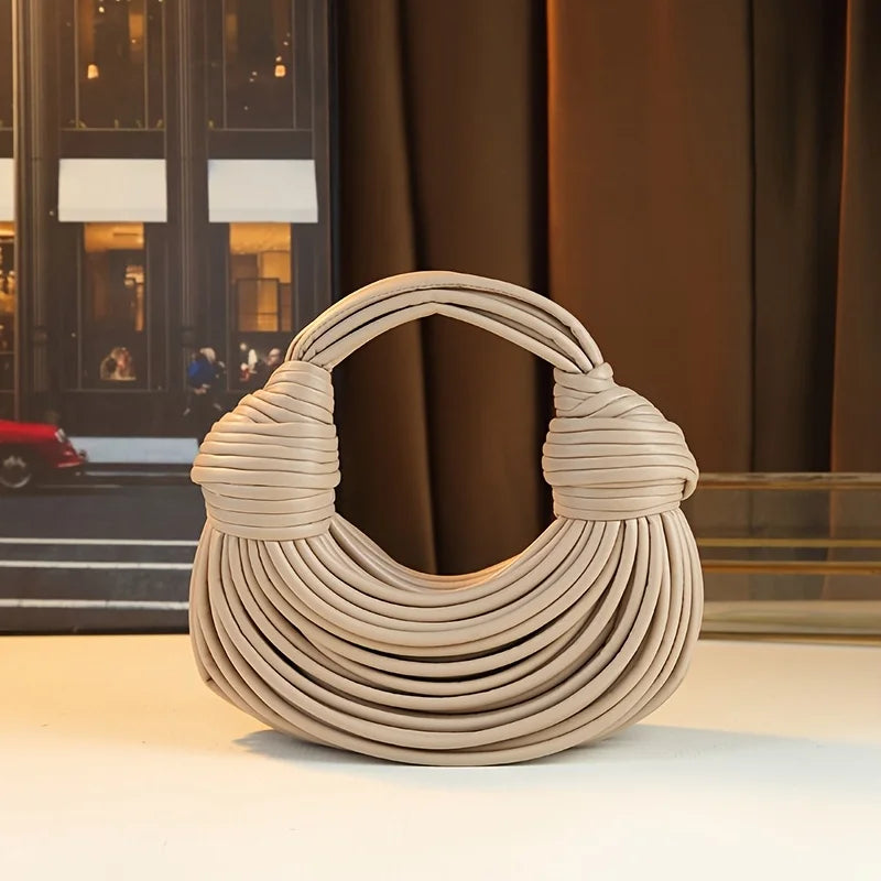 Női kézitáskák 2025 új arany luxus designer márka kézzel szőtt tésztatáskák kötél csomózott húzott hobo ezüst estélyi clutch sikkes