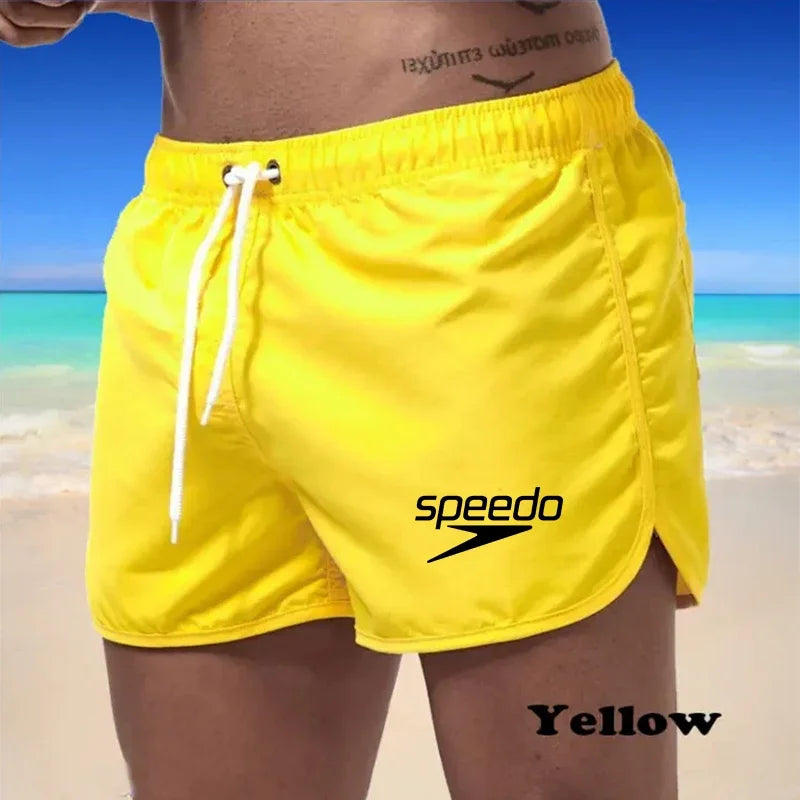 Szexi férfi fürdőruha strand úszónadrág szörfdeszkához