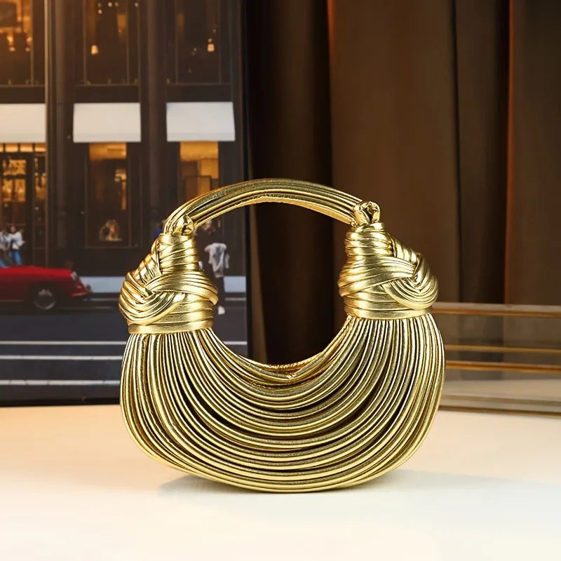 Női kézitáskák 2025 új arany luxus designer márka kézzel szőtt tésztatáskák kötél csomózott húzott hobo ezüst estélyi clutch sikkes