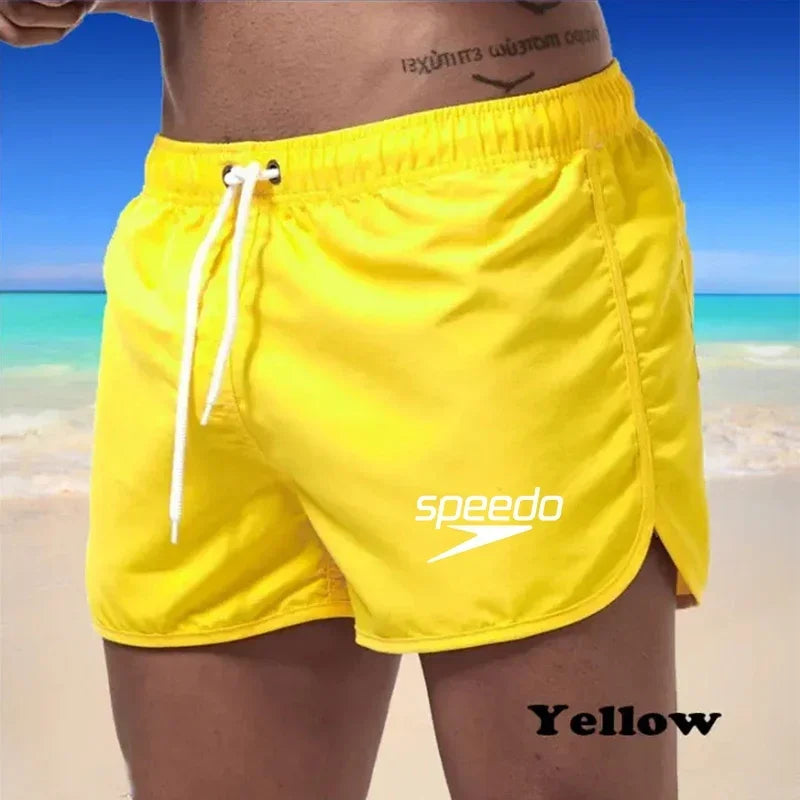 Szexi férfi fürdőruha strand úszónadrág szörfdeszkához