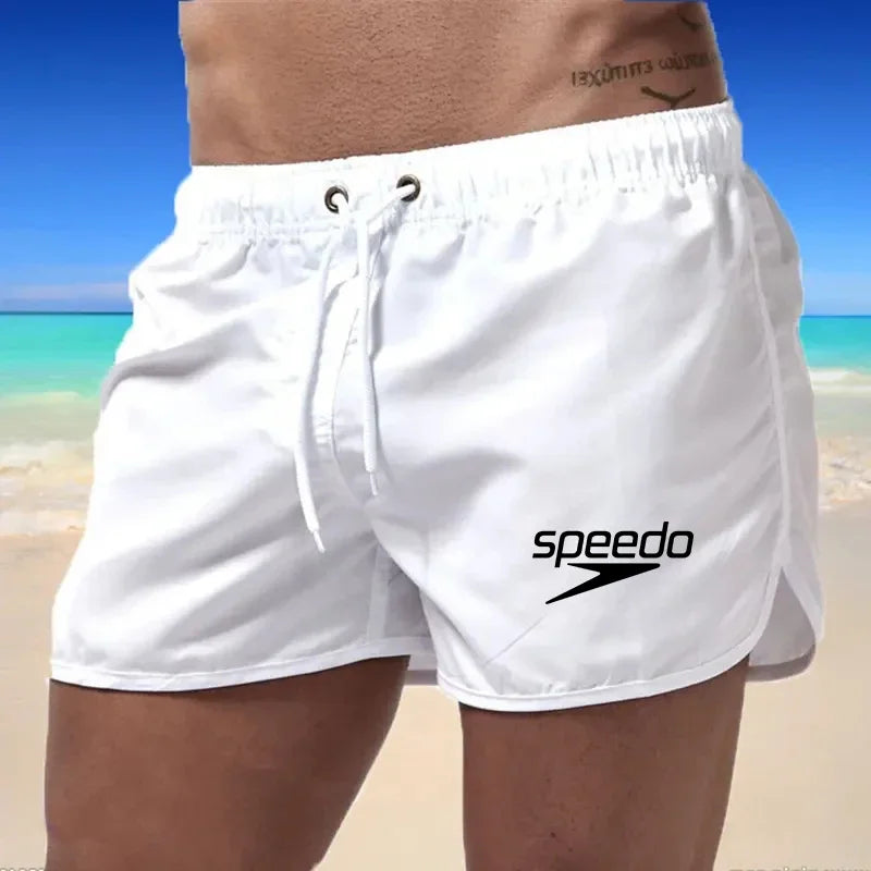Szexi férfi fürdőruha strand úszónadrág szörfdeszkához