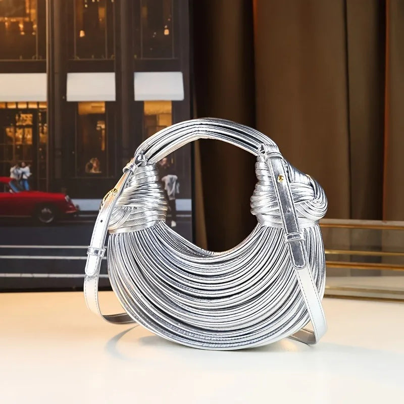 Női kézitáskák 2025 új arany luxus designer márka kézzel szőtt tésztatáskák kötél csomózott húzott hobo ezüst estélyi clutch sikkes